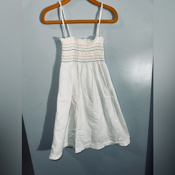 Candie’s Girls white sundress with brightly colored smocking threads. - Picture 1 of 3